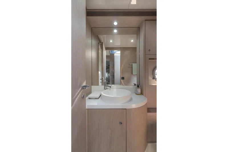 Mild Things Yacht Photos Pics Luxurious bathroom interior of 2014 Riva 63 Virtus yacht with modern fixtures.