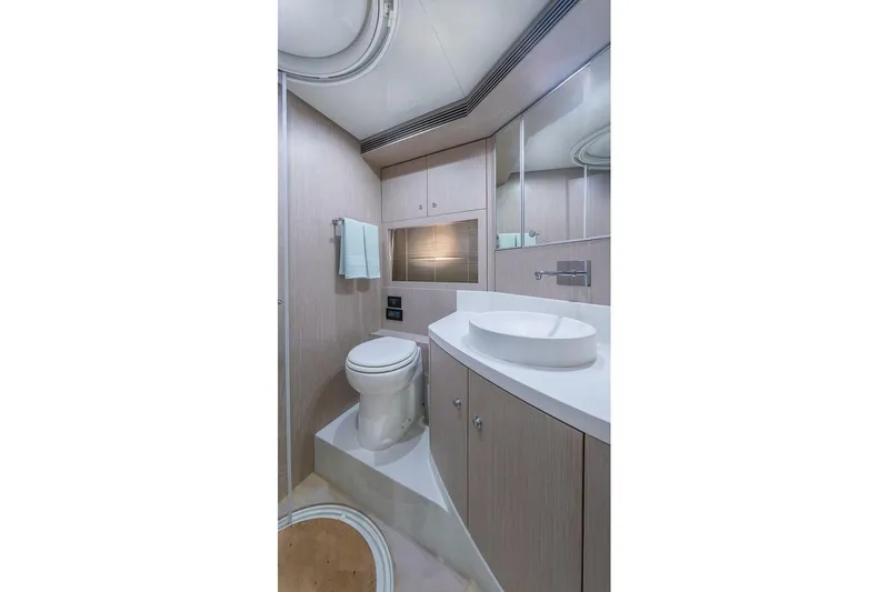 Mild Things Yacht Photos Pics Luxurious bathroom interior of 2014 Riva 63 Virtus yacht with modern fixtures.