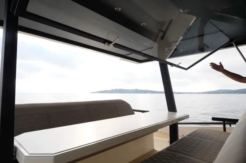  Yacht Photos Pics Luxurious 2019 DutchCraft DC56 yacht interior with open deck and scenic ocean view.