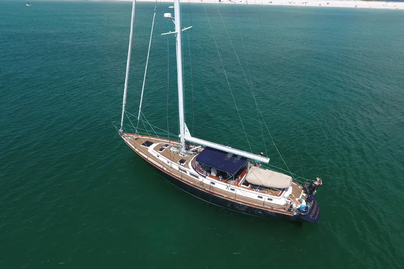 Independence Yacht Photos Pics Aerial view of 1981 Gulfstar 60 CC sailboat on calm ocean waters.