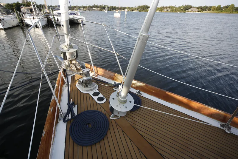 Independence Yacht Photos Pics 1981 Gulfstar 60 CC sailboat deck with winches and ropes, docked in a marina.