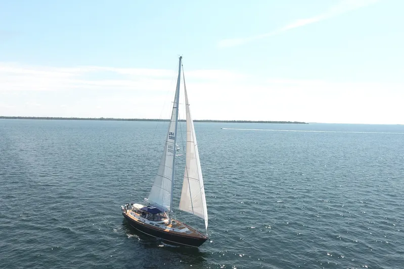 Independence Yacht Photos Pics Sailing yacht Gulfstar 60 CC from 1981 on open water under clear skies.