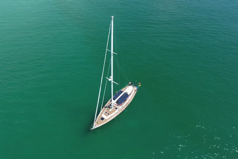 Independence Yacht Photos Pics Aerial view of 1981 Gulfstar 60 CC sailboat on calm green water.