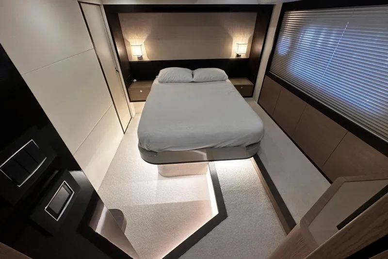  Yacht Photos Pics Luxurious bedroom interior of 2020 Absolute NAVETTA 48 yacht, featuring modern design and ambient lighting.