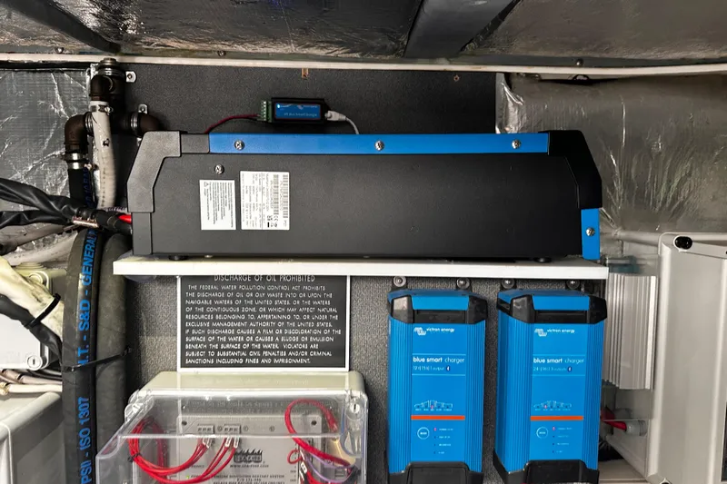  Yacht Photos Pics Electrical system components in a 2020 Absolute NAVETTA 48 yacht, featuring Victron Energy chargers.