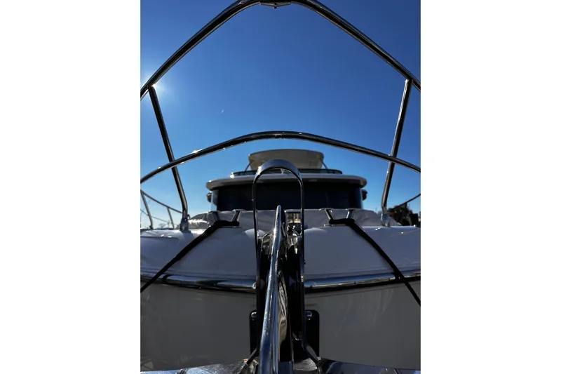  Yacht Photos Pics 2020 Absolute NAVETTA 48 yacht bow under clear blue sky.