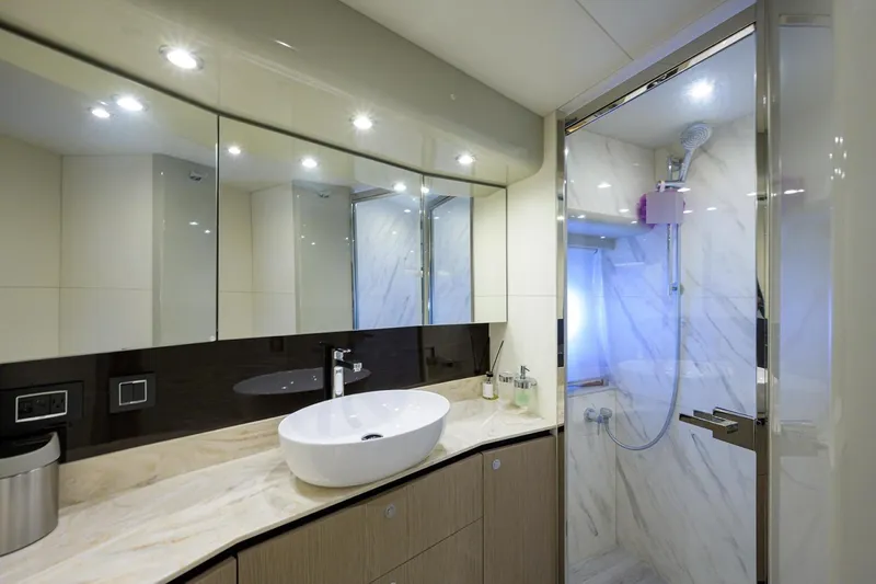  Yacht Photos Pics Luxurious bathroom in 2020 Absolute NAVETTA 48 yacht with modern fixtures and elegant design.