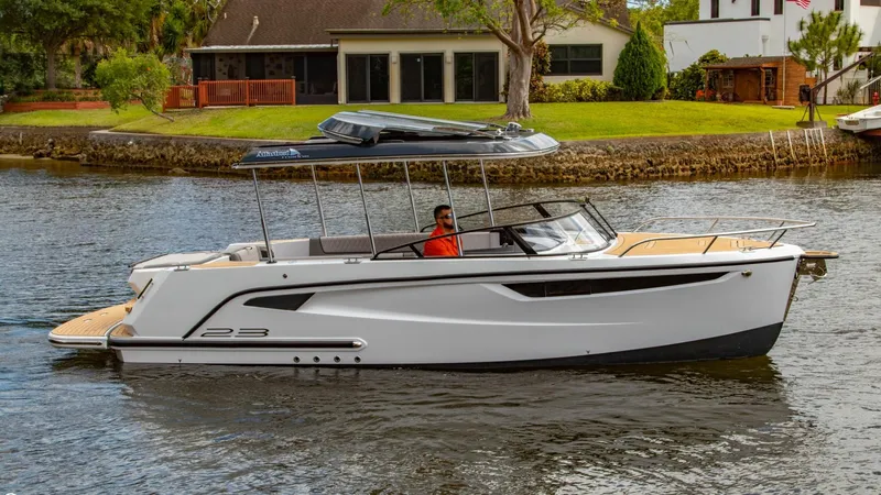  Yacht Photos Pics 2023 Alfastreet 23 Cabin Electric boat cruising on a river.