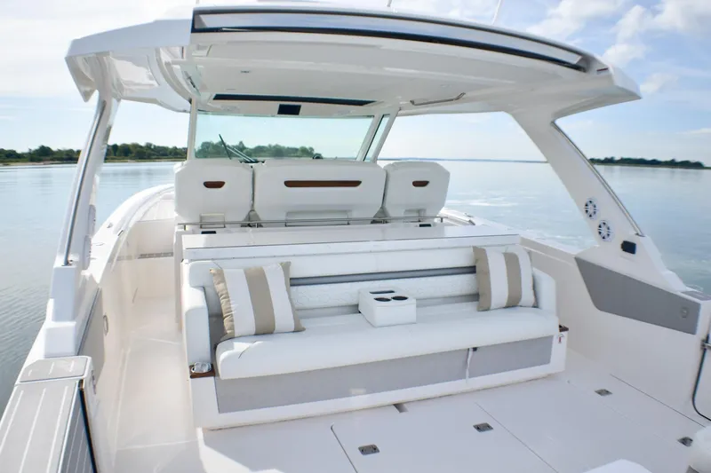 Str8to Yacht Photos Pics 2025 Tiara Yachts 43 LS luxury boat interior with plush seating and scenic water view.