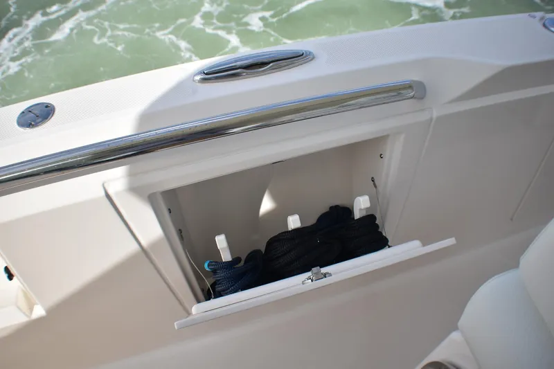 Str8to Yacht Photos Pics 2025 Tiara Yachts 43 LS storage compartment with ropes, open on deck.
