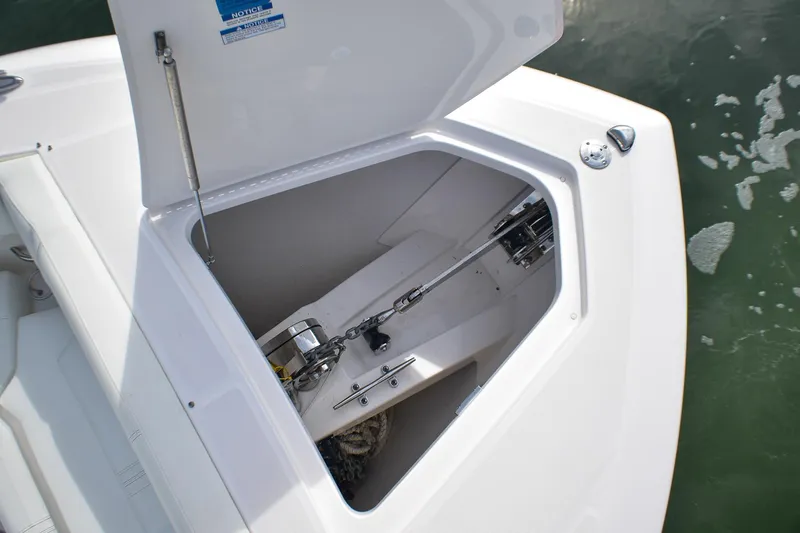 Str8to Yacht Photos Pics 2025 Tiara Yachts 43 LS anchor locker with open hatch, showing chain and winch.