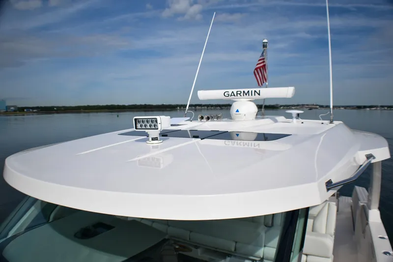 Str8to Yacht Photos Pics 2025 Tiara Yachts 43 LS with Garmin equipment on calm water.