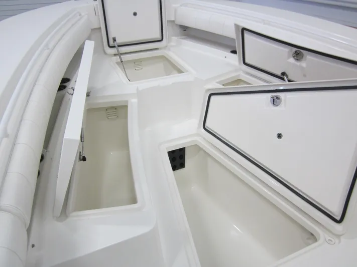  Yacht Photos Pics 2018 Regulator 28 Center Console storage compartments, showcasing spacious and organized design.