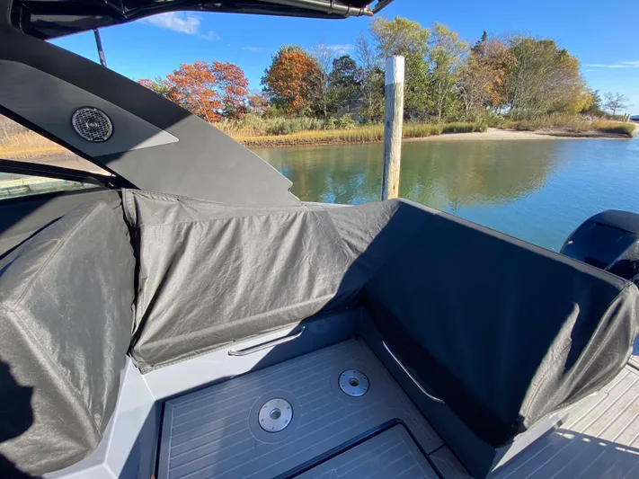  Yacht Photos Pics 2023 Cruisers Yachts 34 GLS OB, rear deck view by scenic waterway.