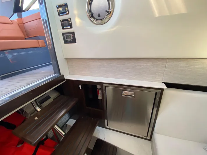  Yacht Photos Pics 2023 Cruisers Yachts 34 GLS OB interior with modern cabinetry and seating.