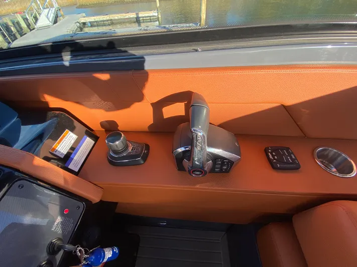  Yacht Photos Pics 2023 Cruisers Yachts 34 GLS OB helm controls with joystick and throttle.