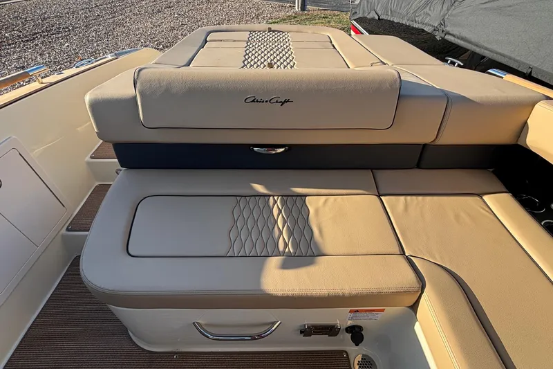  Yacht Photos Pics 2026 Chris-Craft Sportster 28 boat interior with beige leather seating and elegant design.