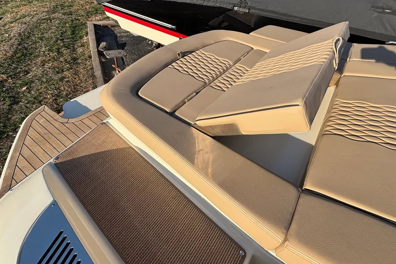  Yacht Photos Pics Luxurious seating on 2026 Chris-Craft Sportster 28 boat with elegant tan upholstery.