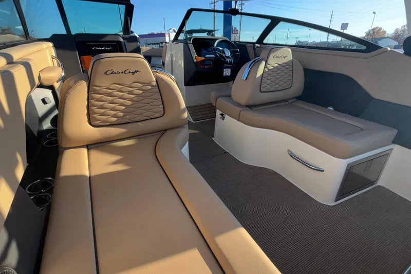  Yacht Photos Pics Luxurious interior of 2026 Chris-Craft Sportster 28 boat with tan leather seating.