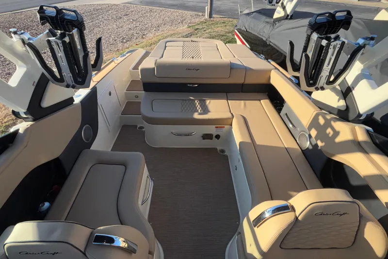  Yacht Photos Pics 2026 Chris-Craft Sportster 28 interior with beige seating and modern design.