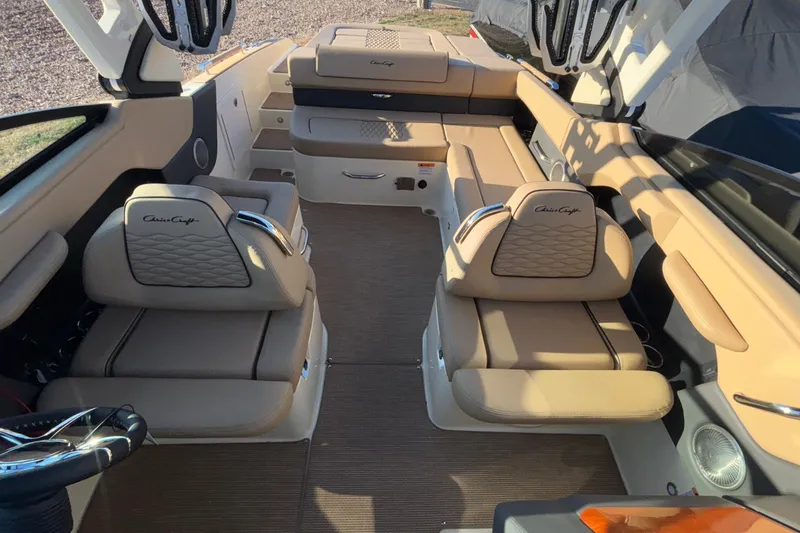  Yacht Photos Pics Luxurious interior of 2026 Chris-Craft Sportster 28 boat with beige seating.
