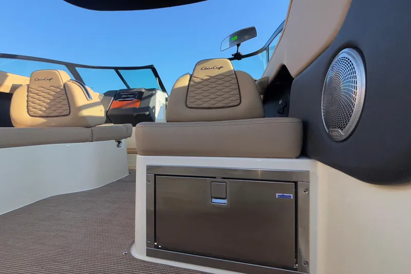  Yacht Photos Pics 2026 Chris-Craft Sportster 28 interior with luxurious seating and modern audio system.