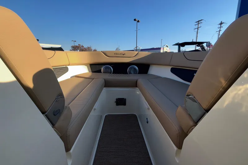  Yacht Photos Pics 2026 Chris-Craft Sportster 28 interior with tan seating and modern design.