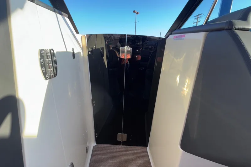  Yacht Photos Pics 2026 Chris-Craft Sportster 28 boat interior with sleek design and modern features.