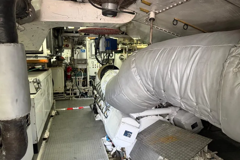  Yacht Photos Pics Engine room of a 1990 Heesen 144 yacht, featuring machinery and equipment.
