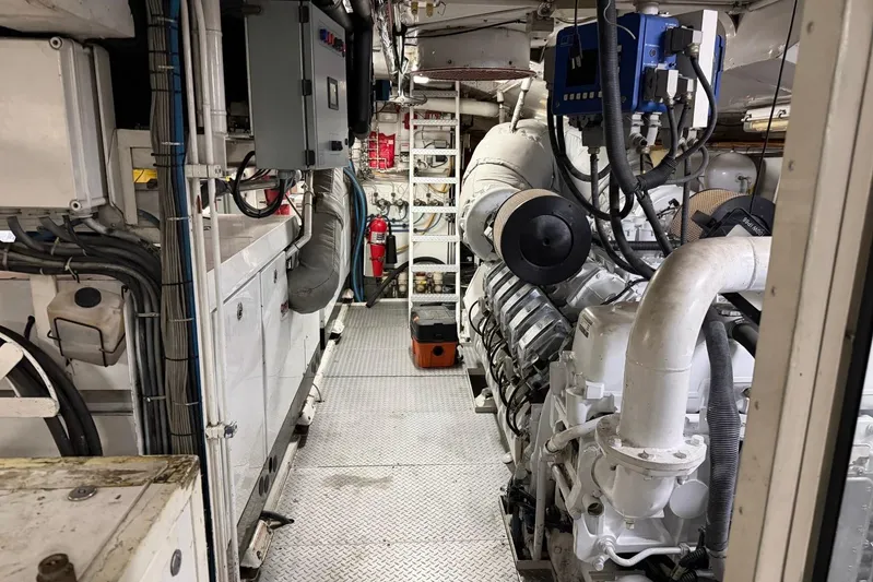  Yacht Photos Pics Engine room of a 1990 Heesen 144 yacht, showcasing machinery and equipment.