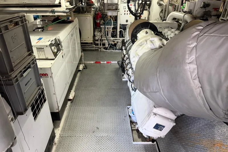  Yacht Photos Pics Engine room of a 1990 Heesen 144 yacht, featuring machinery and equipment.