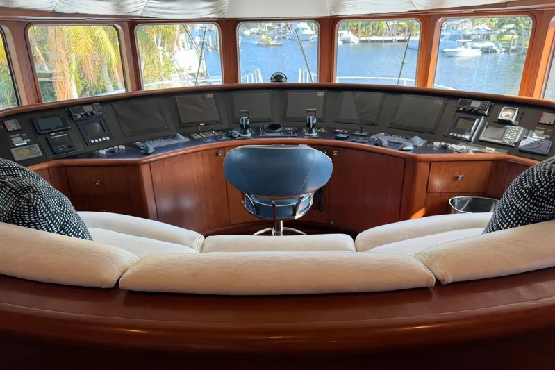  Yacht Photos Pics Luxurious Heesen 144 yacht helm with plush seating and panoramic windows, 1990 model.