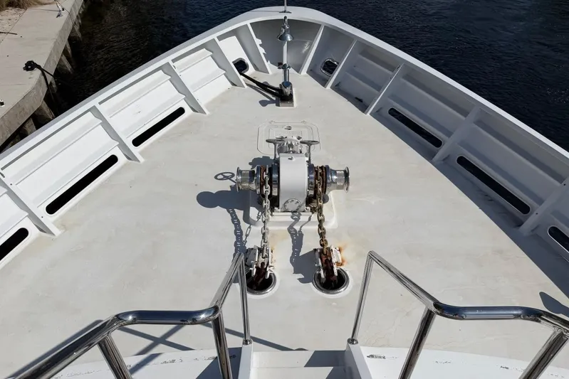  Yacht Photos Pics Bow of 1990 Heesen 144 yacht with anchor chain and winch system.