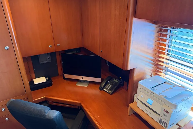  Yacht Photos Pics Office space on 1990 Heesen 144 yacht with desk, computer, phone, and printer.