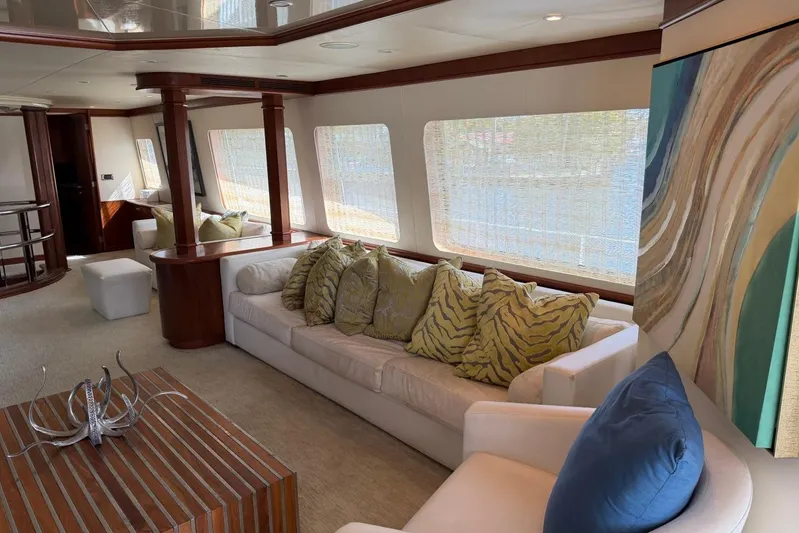  Yacht Photos Pics Luxurious Heesen 144 yacht interior with elegant seating, abstract art, and natural light.