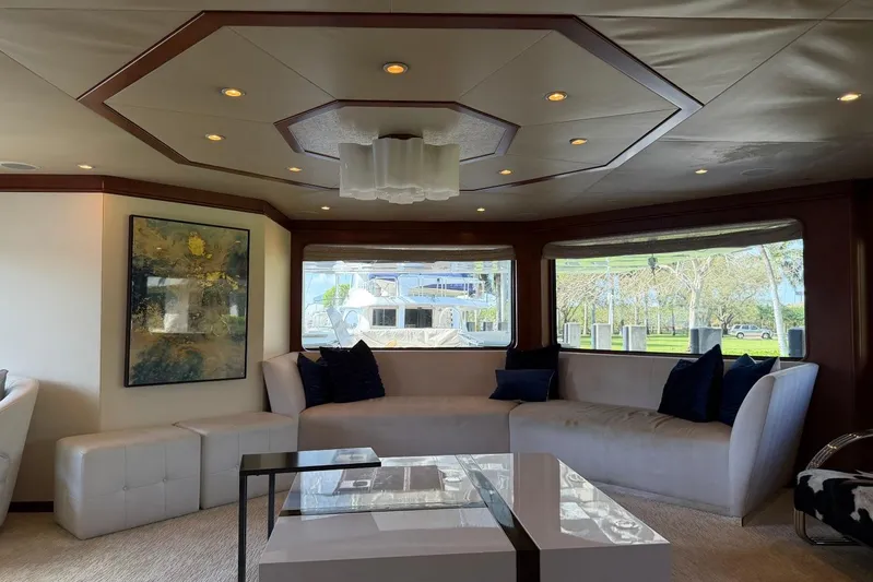  Yacht Photos Pics Luxurious interior of 1990 Heesen 144 yacht with modern decor and large windows.