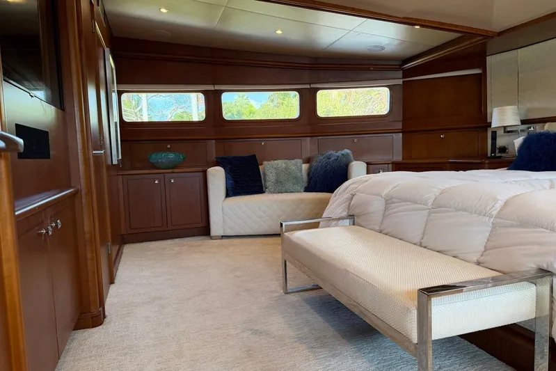  Yacht Photos Pics Luxurious Heesen 144 yacht bedroom interior, featuring elegant wood paneling and plush furnishings, 1990 model.