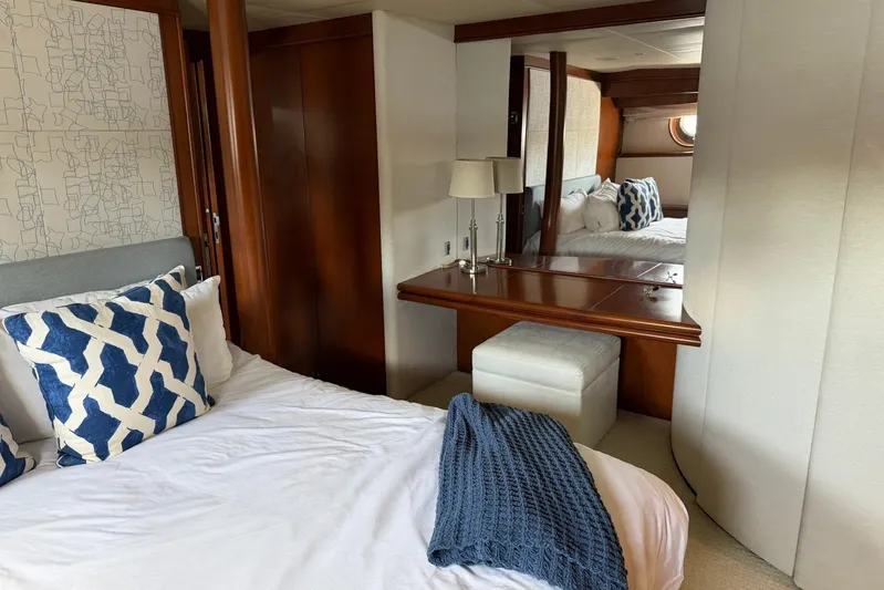  Yacht Photos Pics Luxurious Heesen 144 yacht bedroom with elegant decor and plush bedding, 1990 model.