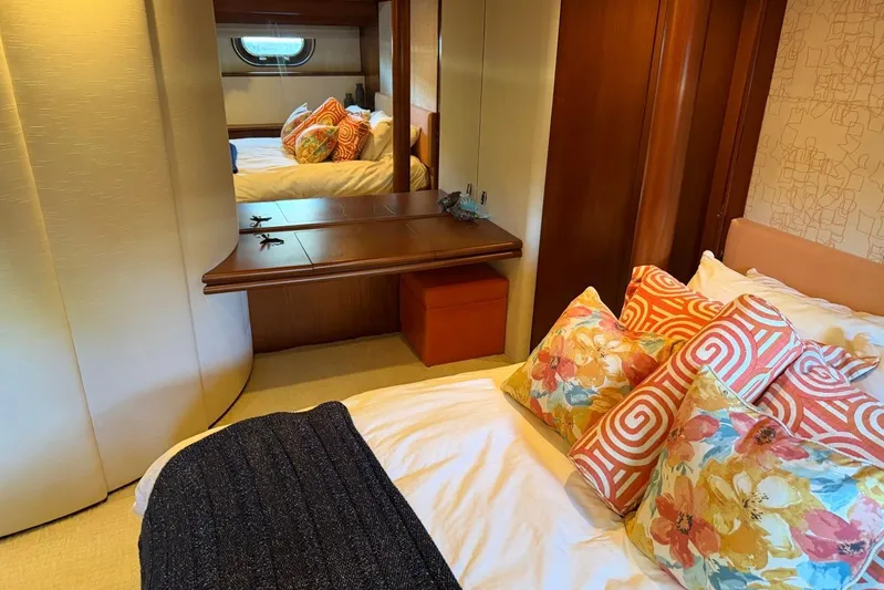  Yacht Photos Pics Luxurious Heesen 144 yacht bedroom with vibrant pillows and elegant wood accents, 1990 model.