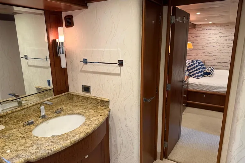  Yacht Photos Pics Luxurious Heesen 144 yacht interior, featuring elegant bathroom and cozy bedroom, 1990 model.