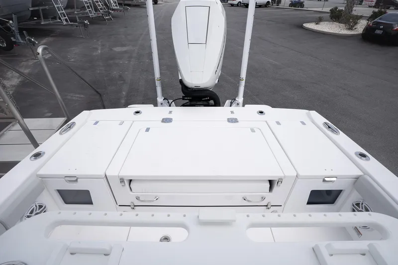  Yacht Photos Pics 2026 Blackfin 262 HB boat deck with storage compartments and outboard motor.
