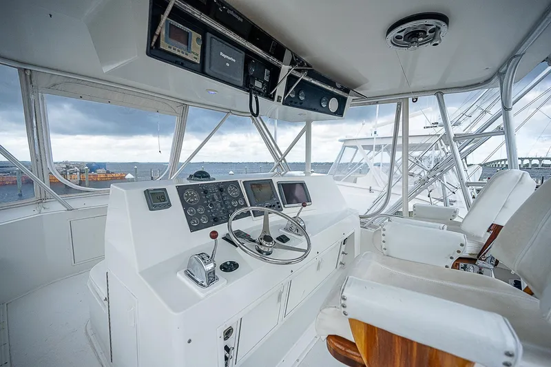  Yacht Photos Pics Interior of 1998 Viking 47 Convertible yacht cockpit with navigation equipment.