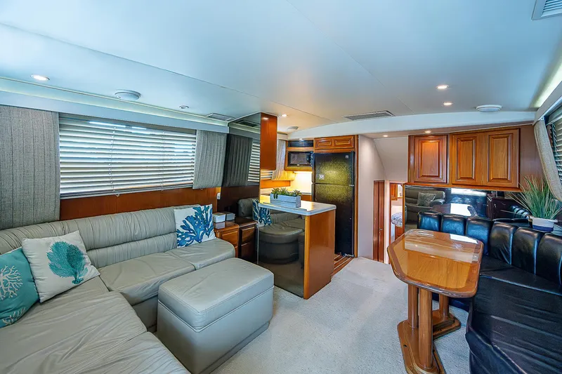  Yacht Photos Pics Interior of 1998 Viking 47 Convertible yacht with modern furnishings and cozy seating area.