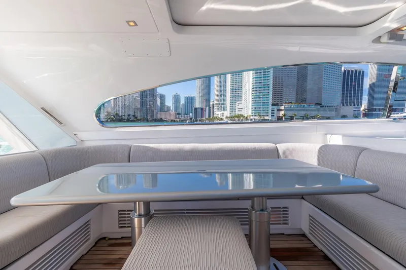 Happy One Yacht Photos Pics Luxurious 2007 Leopard Express Motor Yacht interior with city skyline view.
