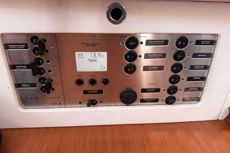 Magic Maddie 2 Yacht Photos Pics Control panel of a 2010 Beneteau Oceanis 43 sailboat, displaying battery and system monitoring.