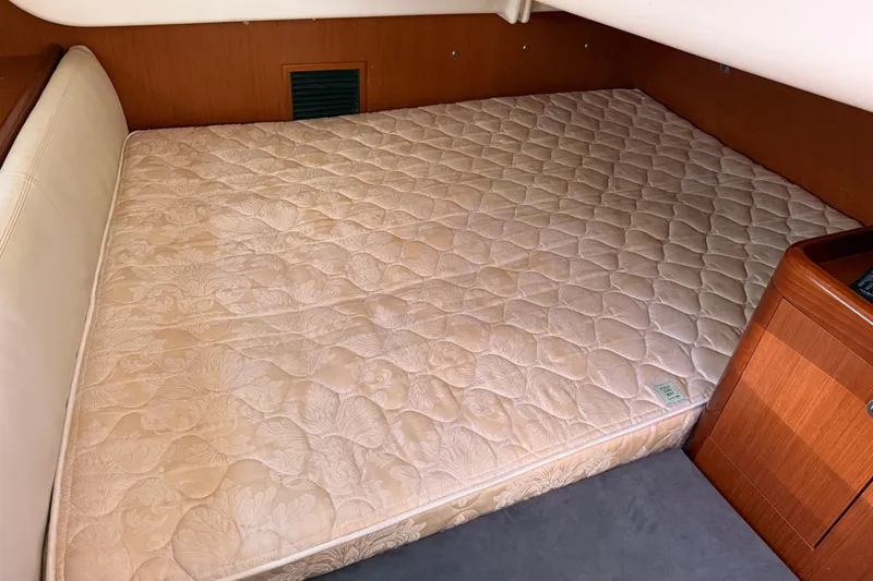 Magic Maddie 2 Yacht Photos Pics Interior cabin of 2010 Beneteau Oceanis 43 with a comfortable mattress.