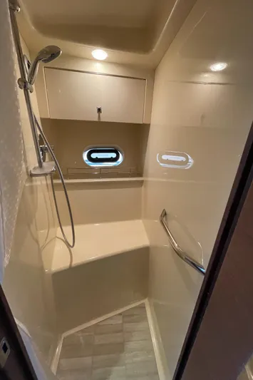 Southern Accent Yacht Photos Pics Shower area in 2014 Sea Ray 470 Sundancer yacht with modern fixtures and lighting.