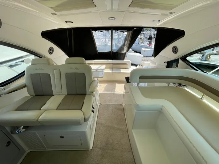 Southern Accent Yacht Photos Pics Luxurious interior of 2014 Sea Ray 470 Sundancer yacht with plush seating.