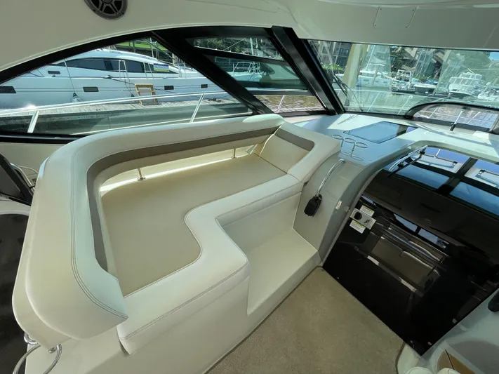 Southern Accent Yacht Photos Pics Luxurious interior of 2014 Sea Ray 470 Sundancer yacht with sleek seating and modern design.