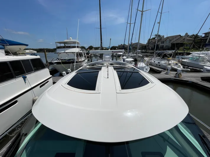 Southern Accent Yacht Photos Pics 2014 Sea Ray 470 Sundancer yacht docked at marina, sunny day.